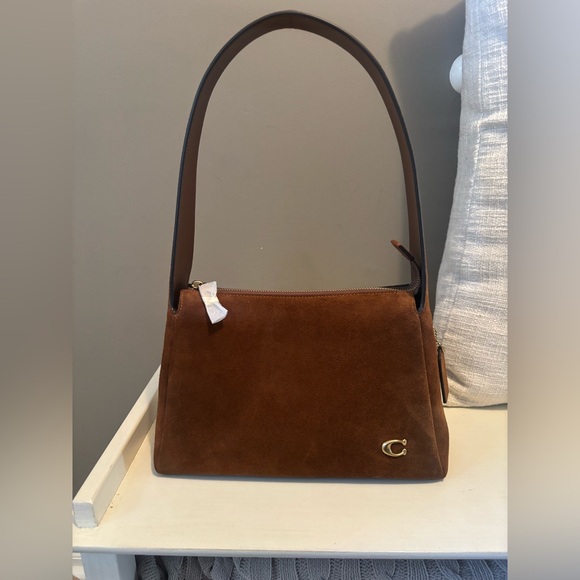 Coach Suede Lola Shoulder Bag
BRAND NEW - Picture 8 of 10